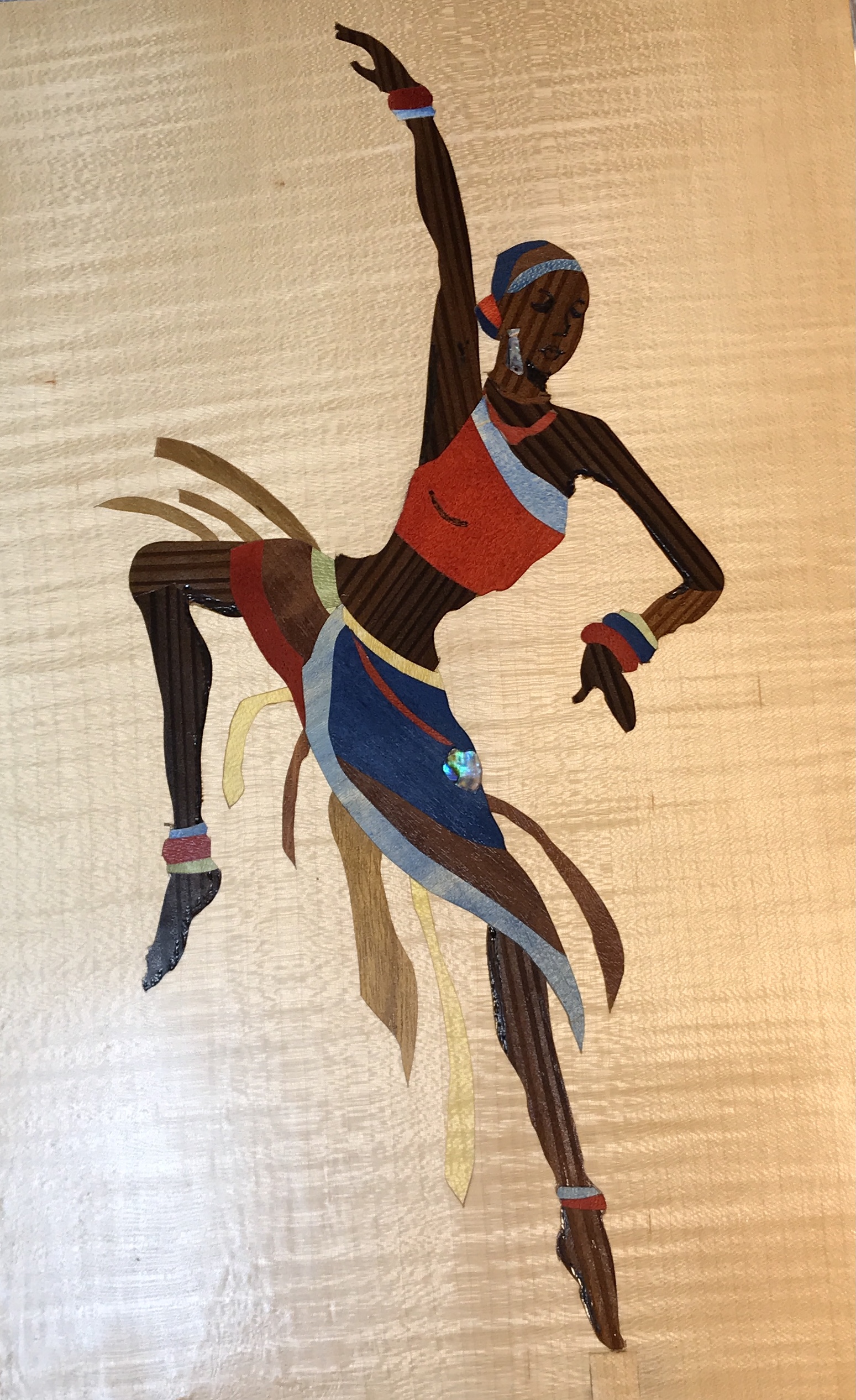 The dancer after two coats of lacquer.